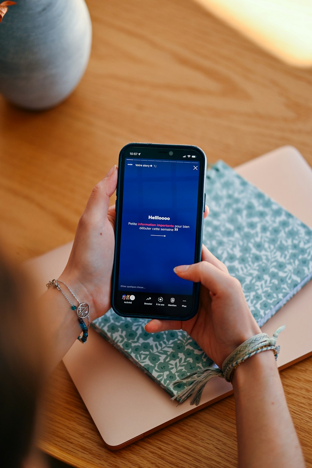 hands-holding-a-smartphone-displaying-a-social-media-feed-gpjwahd8mae